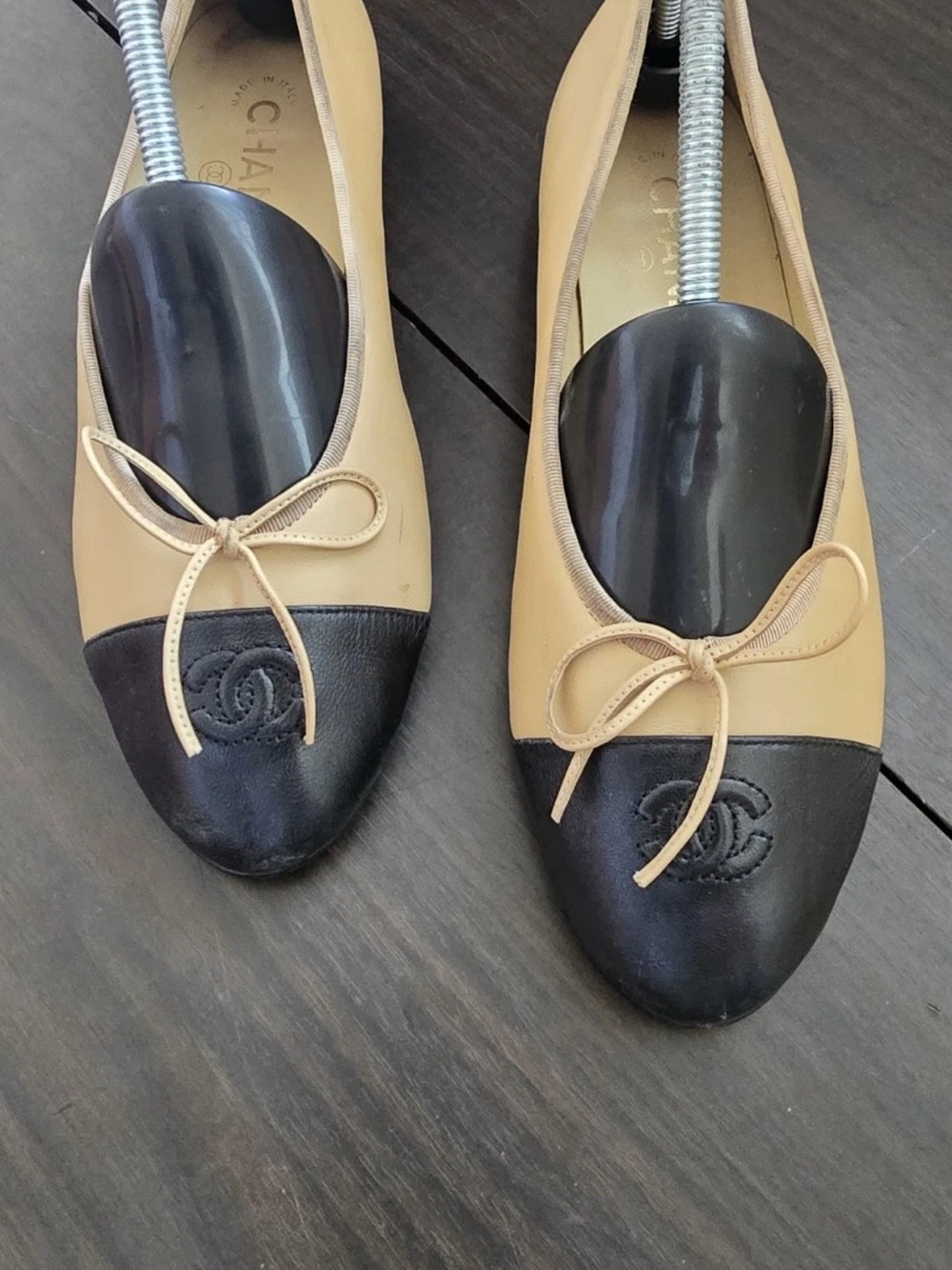 CHANEL Beige and Black Two-Tone Cap-Toe Ballet Flats